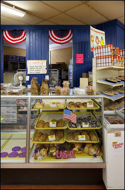 American flag decals adorn the glass display case full of cookies at the bakery in Egolf's IGA supermarket in Churubusco, Indiana.