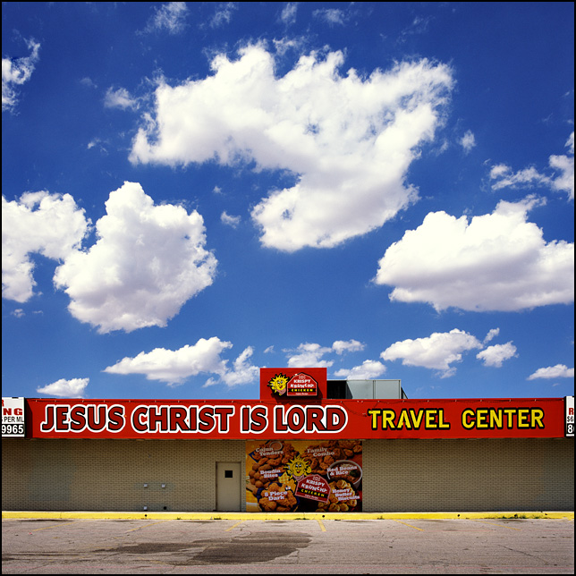 The Jesus Christ is Lord Travel Center on Interstate 40 in Amarillo, Texas. The signs on the front advertise Krispy Krunch Chicken.