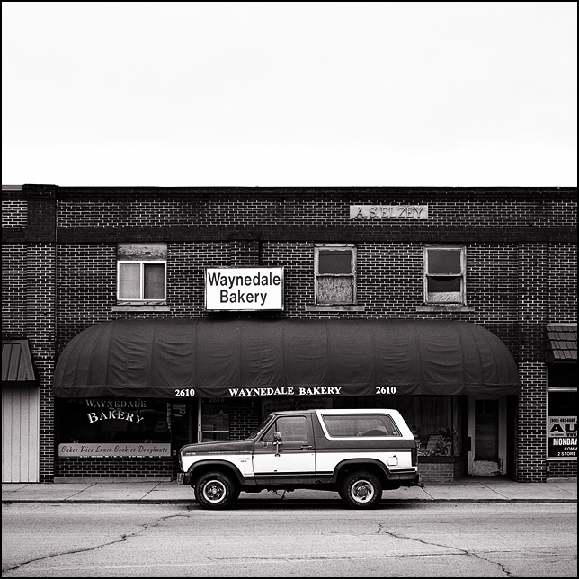 A Ford Bronco parked on the street in front of Waynedale Bakery on Lower Huntington Road in the Waynedale area of Fort Wayne, Indiana.