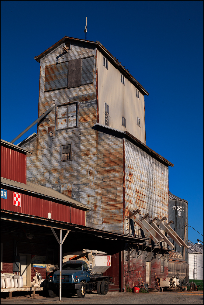 The grain elevator tower at the Etna Elevator animal feed store in the small town of Etna Green, Indiana.