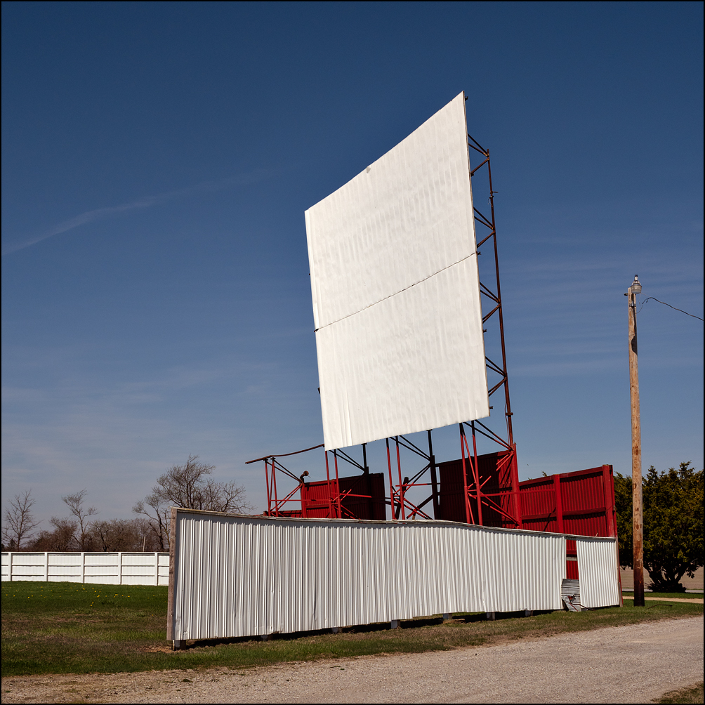 The Auburn-Garrett Drive-In theatre in rural Dekalb County, Indiana. The screen is badly damaged from a severe wind storm.