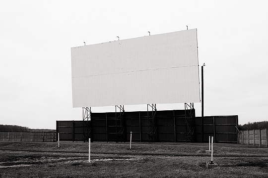 The screen and parking lot of the Auburn-Garrett Drive-In theater in Dekalb County, Indiana.