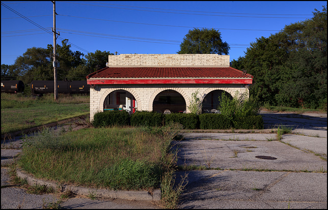 An abandoned Taco Bell restaurant on US-33 in Elkhart, Indiana. This is the old brick Mission-style building design that Taco Bell used in the 1970s.