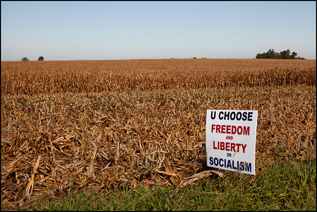 A political sign on the edge of a cornfield on a country road in rural Whitley County, Indiana. U Choose, Freedom and Liberty or Socialism.