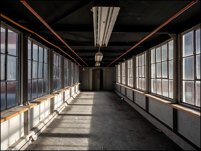 The interior of one of the skybridges connecting two of the old five-story industrial buildings in the General Electric factory complex on Broadway in Fort Wayne, Indiana.