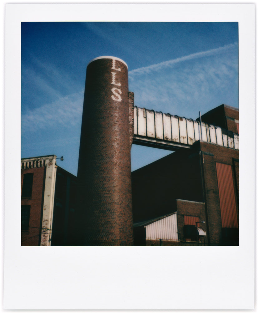 Polaroid snapshot of the smokestack at the former Wayne Knitting Mills factory on Growth Avenue in Fort Wayne, Indiana.