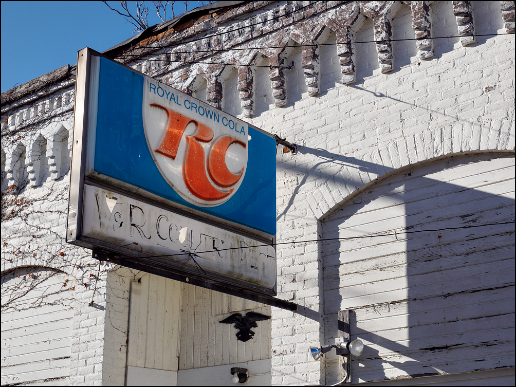 An RC Cola sign on an abandoned restaurant in the small town of Inwood, Indiana. The whitewashed brick building was called the V&R Country Restaurant and RC Lunch Room.