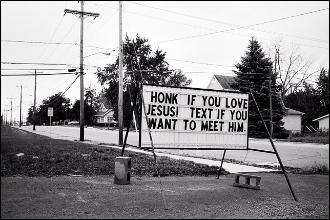 An anti-texting sign along State Road 1 in the small town of Ossian, Indiana. It says Honk if you love Jesus, text if you want to meet him.