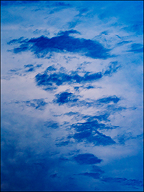 Abstract photographs of dark blue clouds on a July evening in Churubusco Indiana.